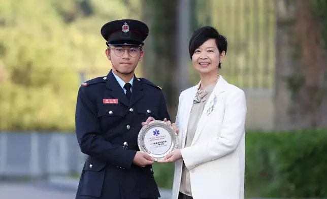 S for Housing reviews Fire Services passing-out parade  Source: HKSAR Government Press Releases