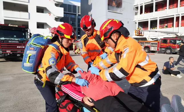 S for Housing reviews Fire Services passing-out parade  Source: HKSAR Government Press Releases