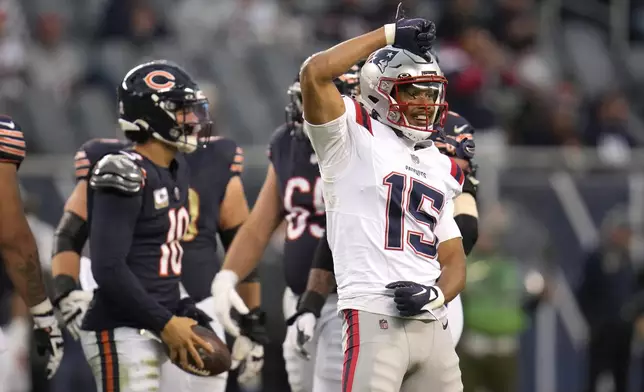 New England Patriots safety Marte Mapu celebrates his sack of Chicago Bears quarterback Caleb Williams in the closing moments of the Patriots' 19-3 win in an NFL football game Sunday, Nov. 10, 2024, in Chicago. (AP Photo/Erin Hooley)