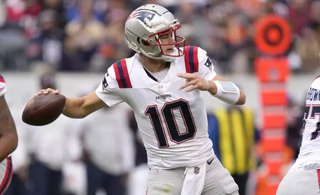 New England Patriots quarterback Drake Maye passes during the first half of an NFL football game against the Chicago Bears on Sunday, Nov. 10, 2024, in Chicago. (AP Photo/Erin Hooley)