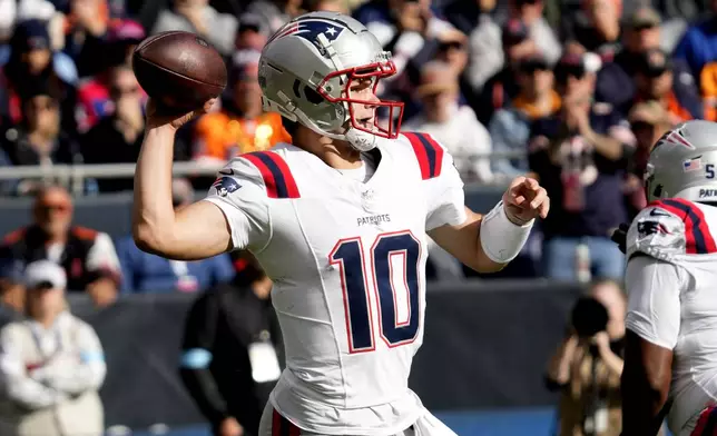 New England Patriots quarterback Drake Maye passes during the first half of an NFL football game against the Chicago Bears on Sunday, Nov. 10, 2024, in Chicago. (AP Photo/Nam Y. Huh)