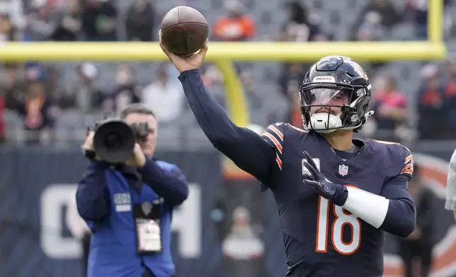 Chicago Bears quarterback Caleb Williams warms up before an NFL football game against the New England Patriots on Sunday, Nov. 10, 2024, in Chicago. (AP Photo/Nam Y. Huh)