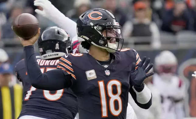 Chicago Bears quarterback Caleb Williams passes during the first half of an NFL football game against the New England Patriots on Sunday, Nov. 10, 2024, in Chicago. (AP Photo/Nam Y. Huh)