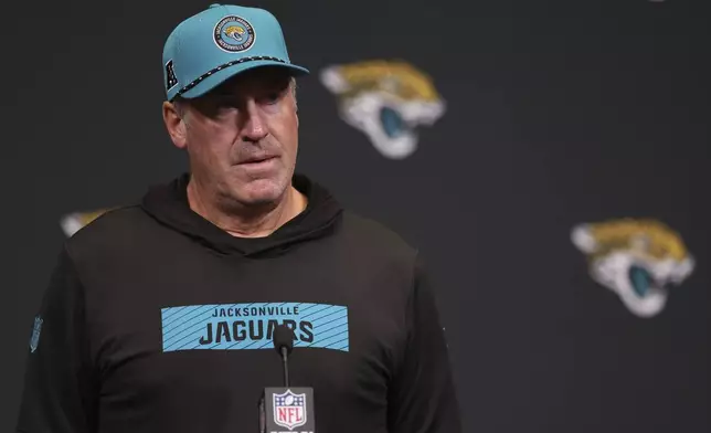 New England Patriots head coach Doug Pederson addresses the media after an NFL football game against the Jacksonville Jaguars, Sunday, Oct. 20, 2024, in London. (AP Photo/Ian Walton)