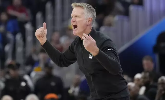 Golden State Warriors head coach Steve Kerr reacts during the first half of an NBA basketball game against the New Orleans Pelicans in San Francisco, Wednesday, Oct. 30, 2024. (AP Photo/Jeff Chiu)