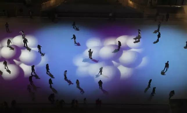 A view of The Rink at Rockefeller Center, as seen from several stories up inside Rockefeller Center, Saturday, Nov. 2, 2024, in New York, as Democratic presidential nominee Vice President Kamala Harris made an unannounced trip there to appear on an episode of NBC's "Saturday Night Live." (AP Photo/Jacquelyn Martin)