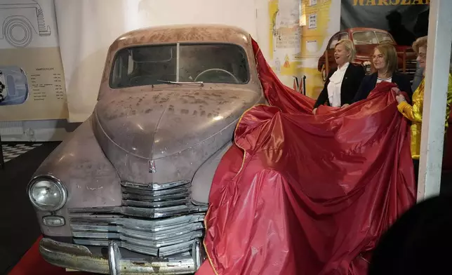 This Warszawa M-20 car with serial number 000001, based on a Soviet Union's model, was the first vehicle to leave a car factory in Poland after World War II, on Nov. 6, 1951 and now, 73 years later, it goes on public display at a private museum in Otrebusy, central Poland, on Wednesday, Nov. 6, 2024. (AP Photo/Czarek Sokolowski)