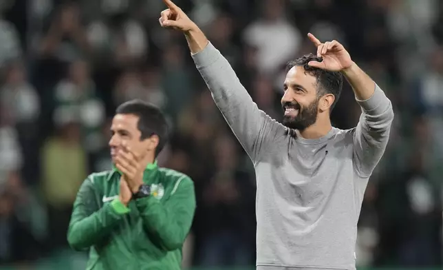 Sporting's head coach Ruben Amorim leaves the pitch after the UEFA Champions League opening phase match between Sporting and Manchester City in Lisbon, Portugal, Tuesday, Nov. 5, 2024. (AP Photo/Armando Franca)