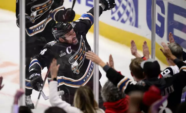 Washington Capitals left wing Alex Ovechkin (8) celebrates his goal during the third period of an NHL hockey game against the Nashville Predators, Wednesday, Nov. 6, 2024, in Washington. The Capitals won 3-2. (AP Photo/Nick Wass)