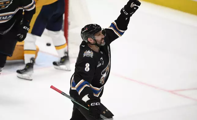 Washington Capitals left wing Alex Ovechkin (8) celebrates his goal during the third period of an NHL hockey game against the Nashville Predators, Wednesday, Nov. 6, 2024, in Washington. The Capitals won 3-2. (AP Photo/Nick Wass)