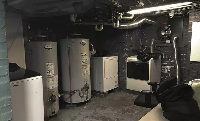 This June 13, 2024 photo shows a laundry area in the basement of the Huntington Addiction Wellness Center, formerly the Huntington Work Release Center where April Youst was assigned as a prisoner in Huntington, W. Va. (AP Photo/Margie Mason)