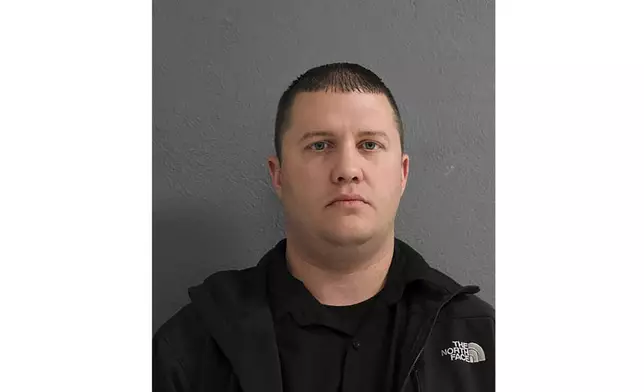 This March 6, 2018 booking photo taken by the Huntington, W. Va. Police Department shows former Huntington Work Release Center correctional officer James Widen. (City of Huntington via AP)