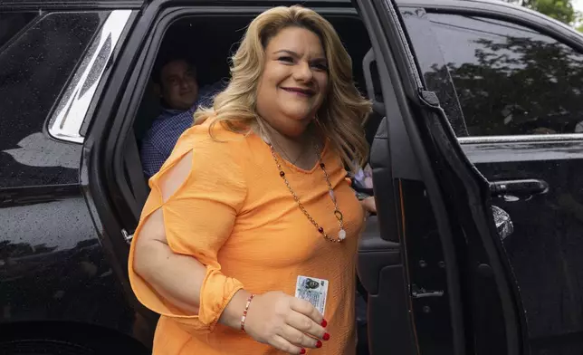 Jenniffer González, Puerto Rico's New Progressive Party candidate for Governor, arrives to vote in the general elections in San Juan, Puerto Rico, Tuesday, Nov. 5, 2024. (AP Photo/Alejandro Granadillo)