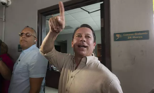 Juan Dalmau, Puerto Rico's Independence Party candidate for Governor, arrives to a polling station to vote in general elections in San Juan, Puerto Rico, Tuesday, Nov. 5, 2024. (AP Photo/Alejandro Granadillo)