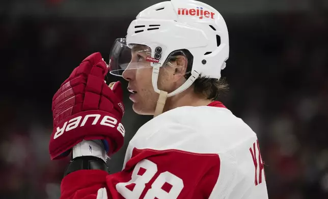 Detroit Red Wings right wing Patrick Kane watches a replay during the first period of an NHL hockey game against the Chicago Blackhawks, Wednesday, Nov. 6, 2024, in Chicago. (AP Photo/Erin Hooley)