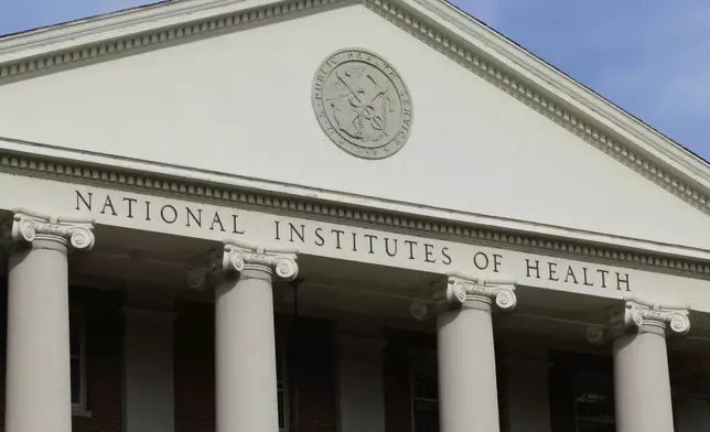 FILE - The administrative building of the National Institutes of Health is shown in Bethesda, Md., Aug. 17, 2009. (AP Photo/J. Scott Applewhite, File)