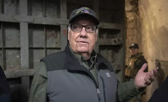 U.S. philanthropist Howard G. Buffett gestures in a shelter during Russian air raid alert in Kharkiv region, Ukraine, Monday, Oct. 28, 2024. (AP Photo/Efrem Lukatsky)