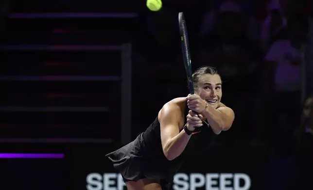 Belarus' Aryna Sabalenka in action during her women's singles semi final match against Coco Gauff of the U.S. at King Saud University Indoor Arena, in Riyadh, Saudi Arabia, Friday, Nov. 8, 2024. (AP Photo)