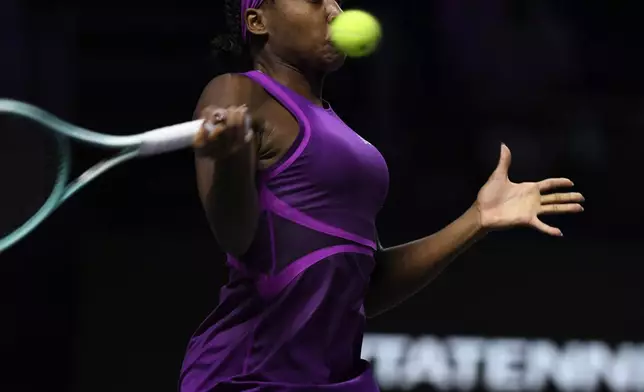 Coco Gauff of the U.S. in action during her women's singles semi final match against Belarus' Aryna Sabalenka at King Saud University Indoor Arena, in Riyadh, Saudi Arabia, Friday, Nov. 8, 2024. (AP Photo)