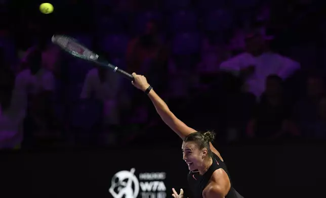 Belarus' Aryna Sabalenka in action during her women's singles semi final match against Coco Gauff of the U.S. at King Saud University Indoor Arena, in Riyadh, Saudi Arabia, Friday, Nov. 8, 2024. (AP Photo)