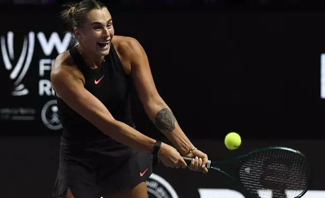 Belarus' Aryna Sabalenka in action during her women's singles semi final match against Coco Gauff of the U.S. at King Saud University Indoor Arena, in Riyadh, Saudi Arabia, Friday, Nov. 8, 2024. (AP Photo)