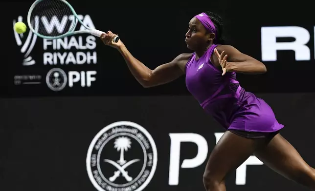 Coco Gauff of the U.S. in action during her women's singles semi final match against Belarus' Aryna Sabalenka at King Saud University Indoor Arena, in Riyadh, Saudi Arabia, Friday, Nov. 8, 2024. (AP Photo)