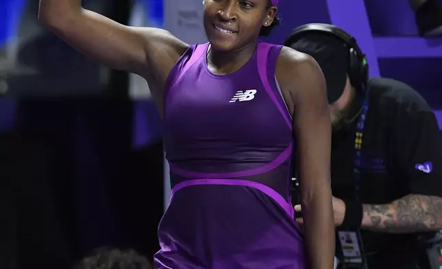 Coco Gauff of the U.S. reacts after winning against China's Qinwen Zheng in their women's singles final match of the WTA finals at the King Saud University Indoor Arena, in Riyadh, Saudi Arabia, Saturday, Nov. 9, 2024. (AP Photo)