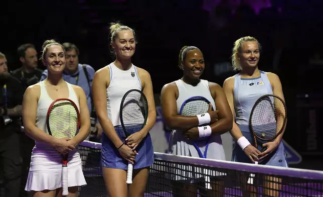 From left, Canada's Gabriela Dabrowski, New Zealand's Erin Routliffe, Taylor Townsend of the U.S. and Katerina Siniakova of the Czech Republic pose ahead of their women's doubles final match of the WTA finals at King Saud University Indoor Arena, in Riyadh, Saudi Arabia, Saturday, Nov. 9, 2024. (AP Photo)