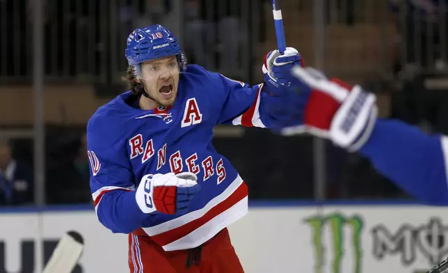 New York Rangers forward Artemi Panarin celebrates his goal during the first period of an NHL hockey game against the Ottawa Senators, Friday, Nov. 1, 2024, in New York. (AP Photo/John Munson)