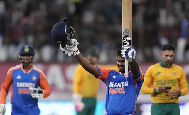 India's batsman Sanju Samson celebrates his century during the T20 International cricket match between South Africa and India, at Kingsmead stadium in Durban, South Africa, Friday, Nov. 8, 2024. (AP Photo/Themba Hadebe)