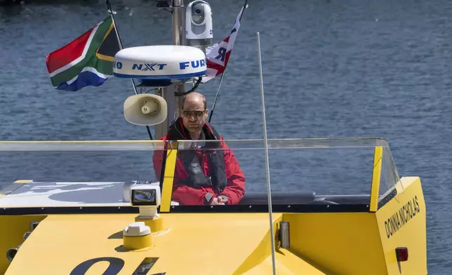 Britain's Prince William sails off with volunteers of the National Sea Rescue Initiative, at Simon's Town harbour nearCape Town, South Africa, Thursday, Nov. 7, 2024. (AP Photo/Jerome Delay, Pool)