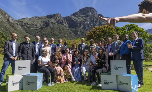 Britain's Prince William poses with finalists of the 2024 Earthshot Prize at the Kirstenbosch Botanical Gardens in Cape Town, South Africa, Wednesday, Nov. 6, 2024. (AP Photo/Jerome Delay, Pool)