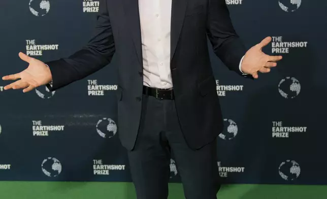 Australian conservationist and television personality Robert Irwin poses on the green carpet before the start of the Earthshot Prize Award ceremony in Cape Town, South Africa, Wednesday, Nov. 6, 2024. (AP Photo/Jerome Delay)