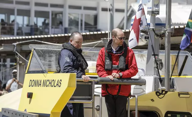 Britain's Prince William, the Prince of Wales, arrives on board a National Sea Rescue Institute (NSRI) boat to meet 2023 Earthshot finalist ABALOBI, at Kalk Bay Harbour, near Cape Town, Thursday, Nov. 7, 2024. (Gianluigi Guercia/Pool Photo via AP)