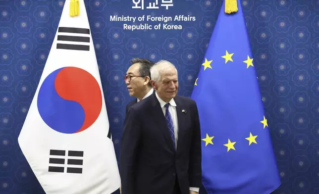 South Korean Foreign Minister Cho Tae-yul, left and European Union foreign policy chief Josep Borrell, arrive for their meeting at the Foreign Ministry, in Seoul, South Korea, Monday, Nov. 4, 2024. ( Chung Sung-Jun/Pool Photo via AP)