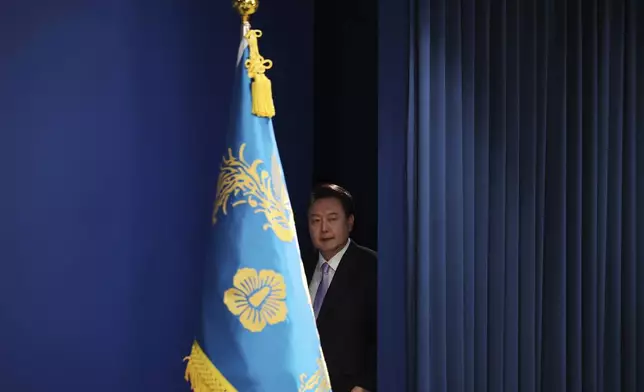 South Korean President Yoon Suk Yeol arrives for a news conference at the Presidential Office in Seoul, South Korea, Thursday, Nov. 7, 2024. (Kim Hong-Ji/Pool Photo via AP)