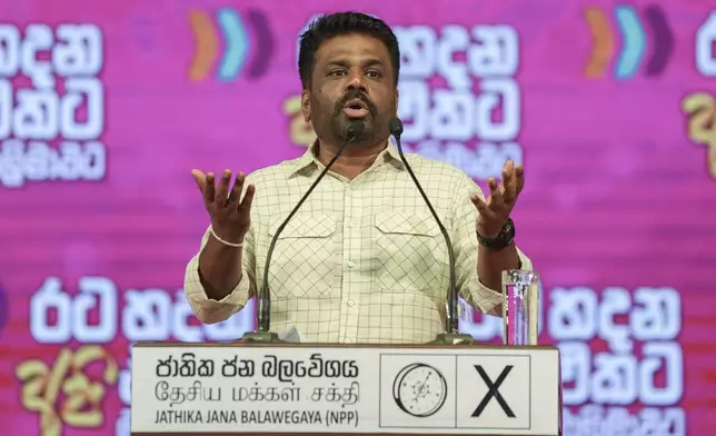 Sri Lankan President Anura Kumara Dissanayake speaks during a public rally ahead of Thursday's parliamentary election in Gampaha, Sri Lanka, Monday, Nov. 11, 2024. (AP Photo/Eranga Jayawardena)