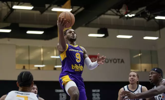 South Bay Lakers guard Bronny James (9) drives to the basket during the first half of an NBA G League basketball game against the Salt Lake City Stars, Saturday, Nov. 9, 2024, in El Segundo, Calif. (AP Photo/Eric Thayer)