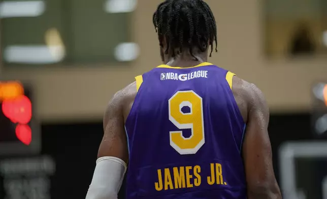 South Bay Lakers guard Bronny James walks on the court during the first half of an NBA G League basketball game against the Salt Lake City Stars, Saturday, Nov. 9, 2024, in El Segundo, Calif. (AP Photo/Eric Thayer)