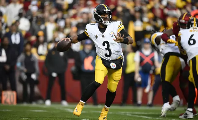 Pittsburgh Steelers quarterback Russell Wilson throws during the first half of an NFL football game against the Washington Commanders, Sunday, Nov. 10, 2024, in Landover, Md. (AP Photo/Nick Wass)