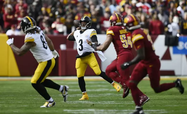 Pittsburgh Steelers quarterback Russell Wilson (3) throws during the first half of an NFL football game against the Washington Commanders, Sunday, Nov. 10, 2024, in Landover, Md. (AP Photo/Nick Wass)