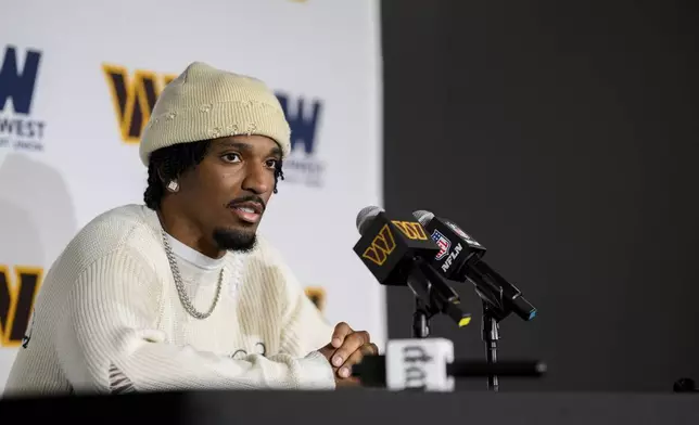 Washington Commanders quarterback Jayden Daniels speaks to the media after an NFL football game against the Pittsburgh Steelers, Sunday, Nov. 10, 2024, in Landover, Md. (AP Photo/Nick Wass)