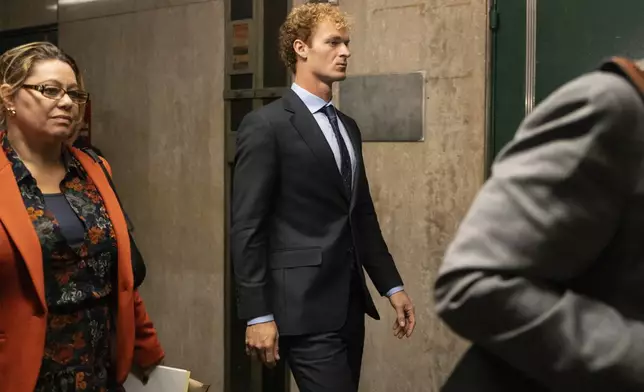 Daniel Penny exits a courtroom for a lunch break in New York, Tuesday, Nov. 12, 2024. (AP Photo/Yuki Iwamura)