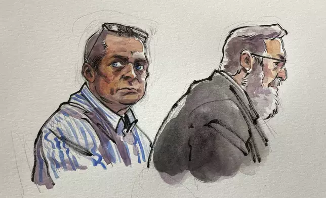 In this courtroom sketch, Richard Allen, left, is seated next to one of his defense attorneys, Andrew Baldwin, inside a courtroom at the Carroll County Courthouse in Delphi, Ind. on Saturday, Nov. 2, 2024. (Li Buszka via AP, Pool)