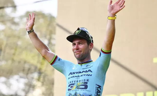 Mark Cavendish of Astana Qazaqstan poses on the podium during the Prudential Singapore Tour De France Criterium, Sunday, November 10th, 2024. (AP Photo/Danial Hakim)