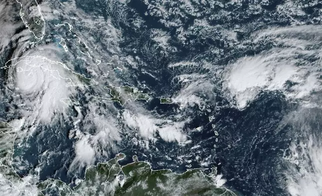 This satellite image provided by NOAA shows Hurricane Rafael on Wednesday, Nov. 6, 2024 in the Caribbean. (NOAA via AP)