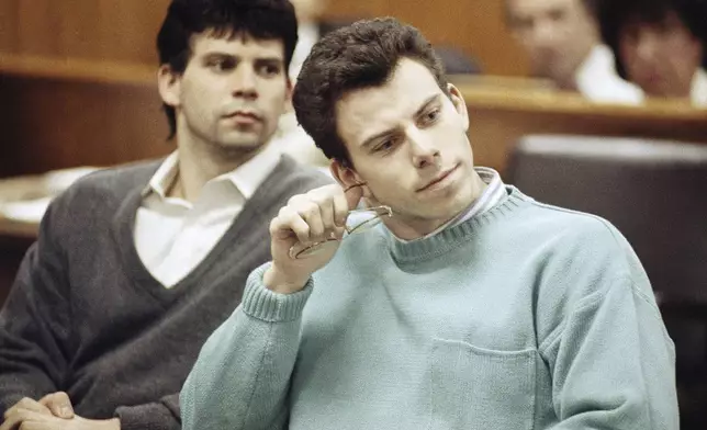 FILE - A preliminary hearing held in Beverly Hills, Calif., for Lyle, left, and Erik Menendez, was postponed as their lawyers fought to keep potentially incriminating evidence out of the case, April 12, 1991. (APP Photo/Kevork Djansezian, File)