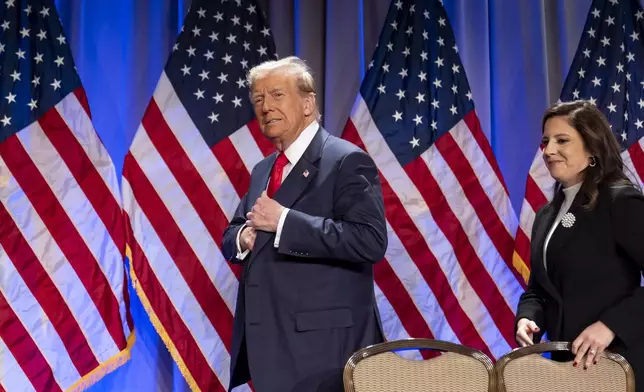 President-elect Donald Trump arrives to speak at a meeting of the House GOP conference, followed by Rep. Elise Stefanik, R-N.Y., Wednesday, Nov. 13, 2024, in Washington. (AP Photo/Alex Brandon)