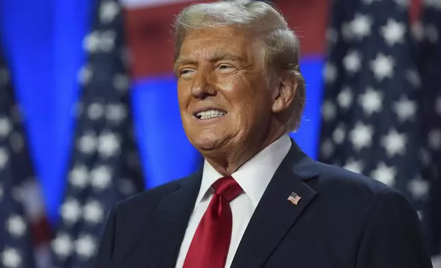 FILE - Republican presidential nominee former President Donald Trump smiles at an election night watch party at the Palm Beach Convention Center, Wednesday, Nov. 6, 2024, in West Palm Beach, Fla. (AP Photo/Evan Vucci, File)