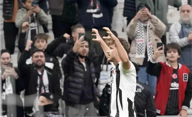 Besiktas' Semih Kilicsoy celebrates after scoring his side's second goal during the Europa League opening phase soccer match between Besiktas and Malmo at the Besiktas stadium in Istanbul, Turkey, Wednesday, Nov. 6, 2024. (AP Photo/Khalil Hamra)
